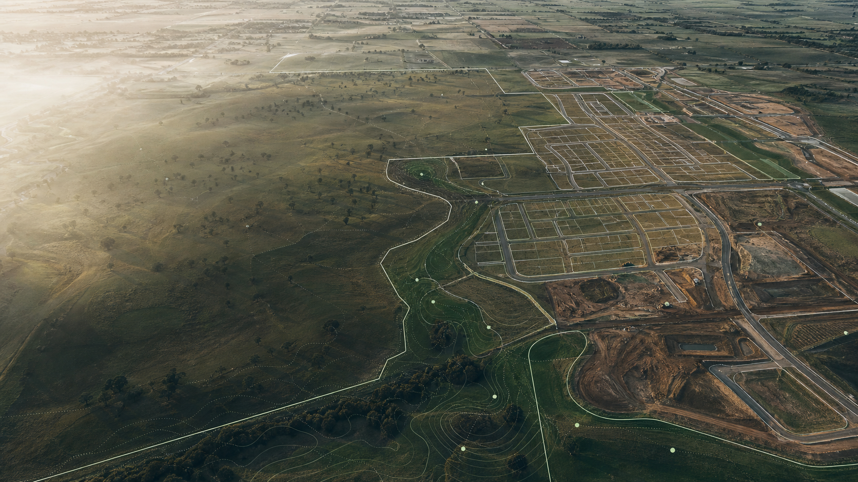 Aerial greenfield growth corridor with estate boundaries and catchment analysis overlays